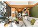 Contemporary living room featuring modern furnishings, exposed beams, and polished concrete floors at 1661 La France Ne St # 314, Atlanta, GA 30307