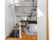 Stylish bedroom with wood floors, a sitting chair, and a comfortable queen-sized bed at 1661 La France Ne St # 314, Atlanta, GA 30307
