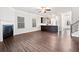 Spacious living room with hardwood floors, fireplace, and open concept layout at 218 Hickory Commons Way, Canton, GA 30115