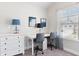 Comfortable bedroom setup with a desk, chair, and window for natural light, perfect for studying at 3786 Lockaby Way, Lawrenceville, GA 30044