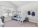 Well-lit bedroom features a bunk bed, two backpacks, and a desk for a shared space at 3786 Lockaby Way, Lawrenceville, GA 30044