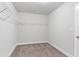 Spacious walk-in closet with shelving ready to organize your wardrobe at 3786 Lockaby Way, Lawrenceville, GA 30044