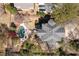 Aerial view of a house with a backyard pool and a lush yard at 3847 Sweet Bottom Dr, Duluth, GA 30096