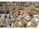 Real estate aerial view of a home and its backyard pool with waterfront views at 3847 Sweet Bottom Dr, Duluth, GA 30096