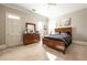 Cozy bedroom with carpet, and warm lighting with furniture, creating a relaxing atmosphere at 3847 Sweet Bottom Dr, Duluth, GA 30096