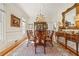 Elegant dining room featuring hardwood floors, chandelier, and formal furnishings at 3847 Sweet Bottom Dr, Duluth, GA 30096