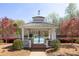 Charming community gazebo next to the tennis court with beautiful landscaping at 3847 Sweet Bottom Dr, Duluth, GA 30096