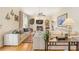 Comfortable living room featuring hardwood floors, a fireplace, and stylish furnishings at 3847 Sweet Bottom Dr, Duluth, GA 30096