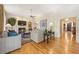 Spacious living room with hardwood floors, fireplace, and neutral decor at 3847 Sweet Bottom Dr, Duluth, GA 30096
