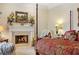 Cozy main bedroom with a fireplace, creating a warm and inviting atmosphere at 3847 Sweet Bottom Dr, Duluth, GA 30096