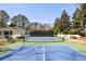 Well-maintained community tennis court with net and green and blue surface at 3847 Sweet Bottom Dr, Duluth, GA 30096
