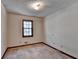 Bedroom with carpet and window at 3960 Rocmar Dr, Snellville, GA 30039