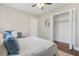 Comfortable bedroom with ceiling fan, closet and an ensuite bathroom, perfect for relaxation and storage at 1013 Columbia Dr, Decatur, GA 30030