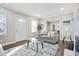 Bright living room with hardwood floors, modern decor, and lots of natural light at 1013 Columbia Dr, Decatur, GA 30030