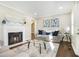 Cozy living room features a fireplace, neutral decor, and ample natural light at 1013 Columbia Dr, Decatur, GA 30030