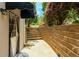 Backyard with exterior steps leading to a patio with a door and awning at 3655 Brisbane Dr, Marietta, GA 30062