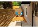 Charming backyard patio with tiled flooring and seating area with potted plants at 3655 Brisbane Dr, Marietta, GA 30062