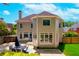 Spacious backyard patio with outdoor dining set, perfect for entertaining and relaxation at 3655 Brisbane Dr, Marietta, GA 30062