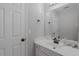 Neutral powder room boasts a modern sink, vanity, and updated fixtures at 3655 Brisbane Dr, Marietta, GA 30062