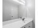 Bright bathroom featuring a large mirror and modern vanity at 3655 Brisbane Dr, Marietta, GA 30062