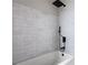 Contemporary bathroom with a modern shower featuring a black shower head at 3655 Brisbane Dr, Marietta, GA 30062