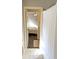 Bright bathroom with a view into a sunlit bedroom featuring hardwood floors and fresh white trim at 3655 Brisbane Dr, Marietta, GA 30062