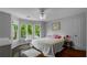 Cozy bedroom features natural light, bay windows, and hardwood floors at 3655 Brisbane Dr, Marietta, GA 30062