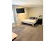 Simple bedroom with neutral carpet, tv, and plenty of space at 3655 Brisbane Dr, Marietta, GA 30062