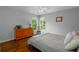 Comfortable bedroom features hardwood floors and large windows at 3655 Brisbane Dr, Marietta, GA 30062