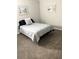 Comfortable bedroom features neutral colors, a cozy bed, and decorative wall art at 3655 Brisbane Dr, Marietta, GA 30062