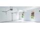 Clean and spacious garage with white walls, windows, and an automatic door opener at 3655 Brisbane Dr, Marietta, GA 30062