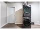 Convenient laundry area with modern stacked washer and dryer at 3655 Brisbane Dr, Marietta, GA 30062