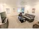 Cozy living room features a plush couch, recliner and entertainment center for relaxing evenings at 3655 Brisbane Dr, Marietta, GA 30062