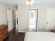 Large main bedroom with hardwood floors provides access to ensuite bathroom at 3655 Brisbane Dr, Marietta, GA 30062