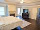 The main bedroom is spacious and bright, with a fireplace, ensuite bathroom and hardwood floors at 3655 Brisbane Dr, Marietta, GA 30062