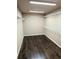 Spacious walk-in closet featuring wire shelving and hardwood floors at 3655 Brisbane Dr, Marietta, GA 30062