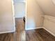 Walk-in closet showing access to bedroom, wood floors, and custom shelving at 3655 Brisbane Dr, Marietta, GA 30062