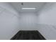 Spacious walk-in closet features built-in shelving and dark hardwood floors at 3655 Brisbane Dr, Marietta, GA 30062