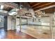 Unfinished basement with exposed ductwork and a garage with a door at 4433 Canary Ct, Lithia Springs, GA 30122