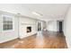 Basement with a brick fireplace, finished flooring, and access to the backyard at 4433 Canary Ct, Lithia Springs, GA 30122