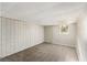 Finished basement featuring a carpeted floor and paneled walls with a window at 4433 Canary Ct, Lithia Springs, GA 30122