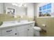 Bathroom with vintage tile, bright lighting, and a window at 4433 Canary Ct, Lithia Springs, GA 30122