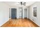 Bedroom with hardwood floors, closets, and access to a bathroom at 4433 Canary Ct, Lithia Springs, GA 30122