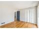 Bedroom with hardwood floors, closet space, and ample natural light at 4433 Canary Ct, Lithia Springs, GA 30122