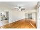 Open-concept living room featuring beautiful hardwood floors and lots of space at 4433 Canary Ct, Lithia Springs, GA 30122