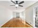 Spacious living room with hardwood floors, ceiling fan, and ample natural light at 4433 Canary Ct, Lithia Springs, GA 30122