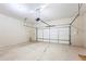 Spacious garage with ample room for parking and storage at 5595 Rolling Acres Ln, Cumming, GA 30028
