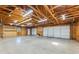 Huge garage offers ample space, workshop areas, and multiple doors at 5595 Rolling Acres Ln, Cumming, GA 30028