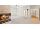 Large main bedroom boasts cozy fireplace and hardwood floors at 5595 Rolling Acres Ln, Cumming, GA 30028