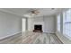 Spacious living room featuring a fireplace and modern flooring at 642 Dogwood Dr, Lawrenceville, GA 30046